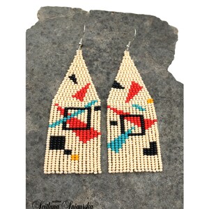Abstract geometric seed bead earrings inspired by Bauhaus design, featuring ivory, black, red and turquoise color blocks with 18K gold-plated ear hooks.