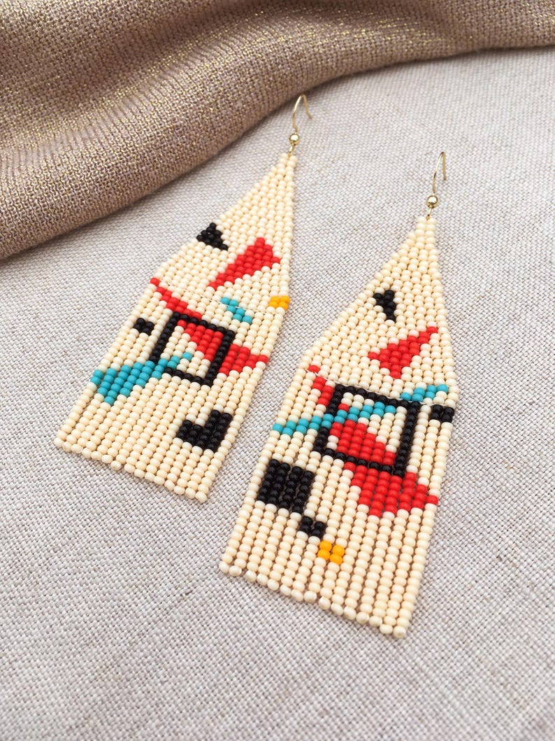 Abstract geometric seed bead earrings inspired by Bauhaus design, featuring ivory, black, red and turquoise color blocks with 18K gold-plated ear hooks.