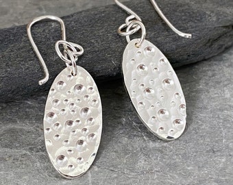 Oval drop earrings, hammered silver earrings, silver dangly earrings, patterned silver, solid silver, unique jewellery designs