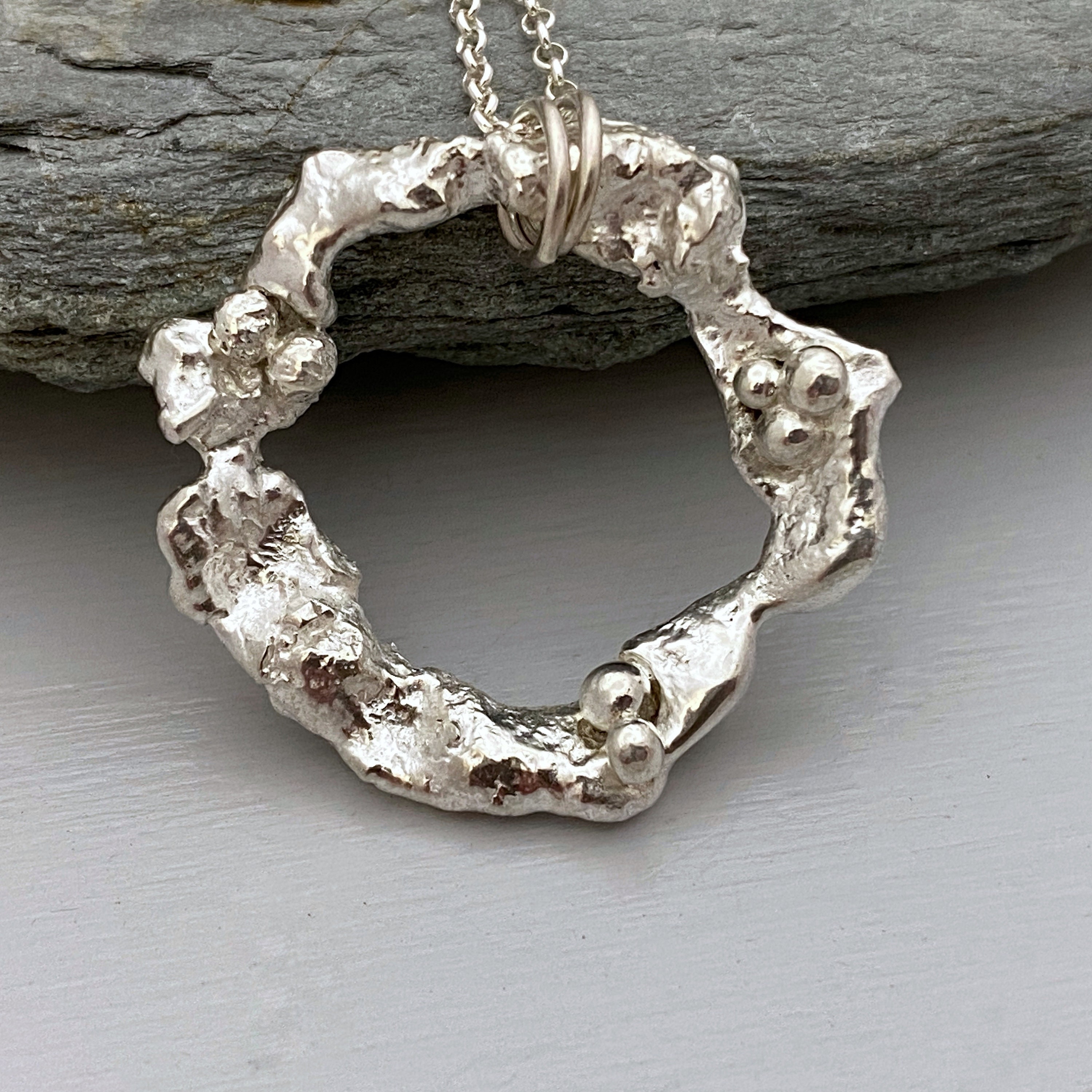 Organic Silver Circle Pendant Made From Molten Recycled
