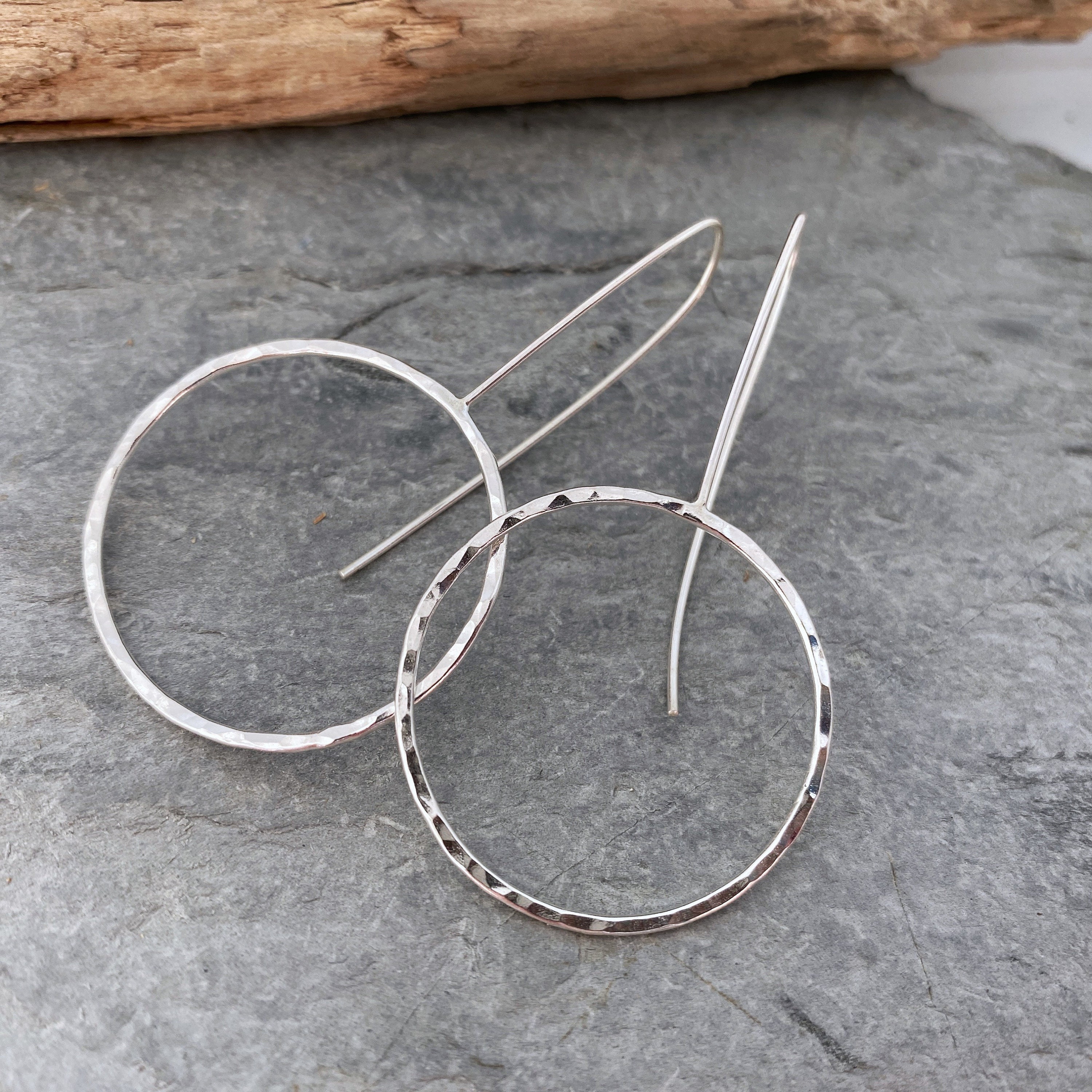 Large Hoop Earrings Made From Hammered Silver in A Simple, Contemporary Design