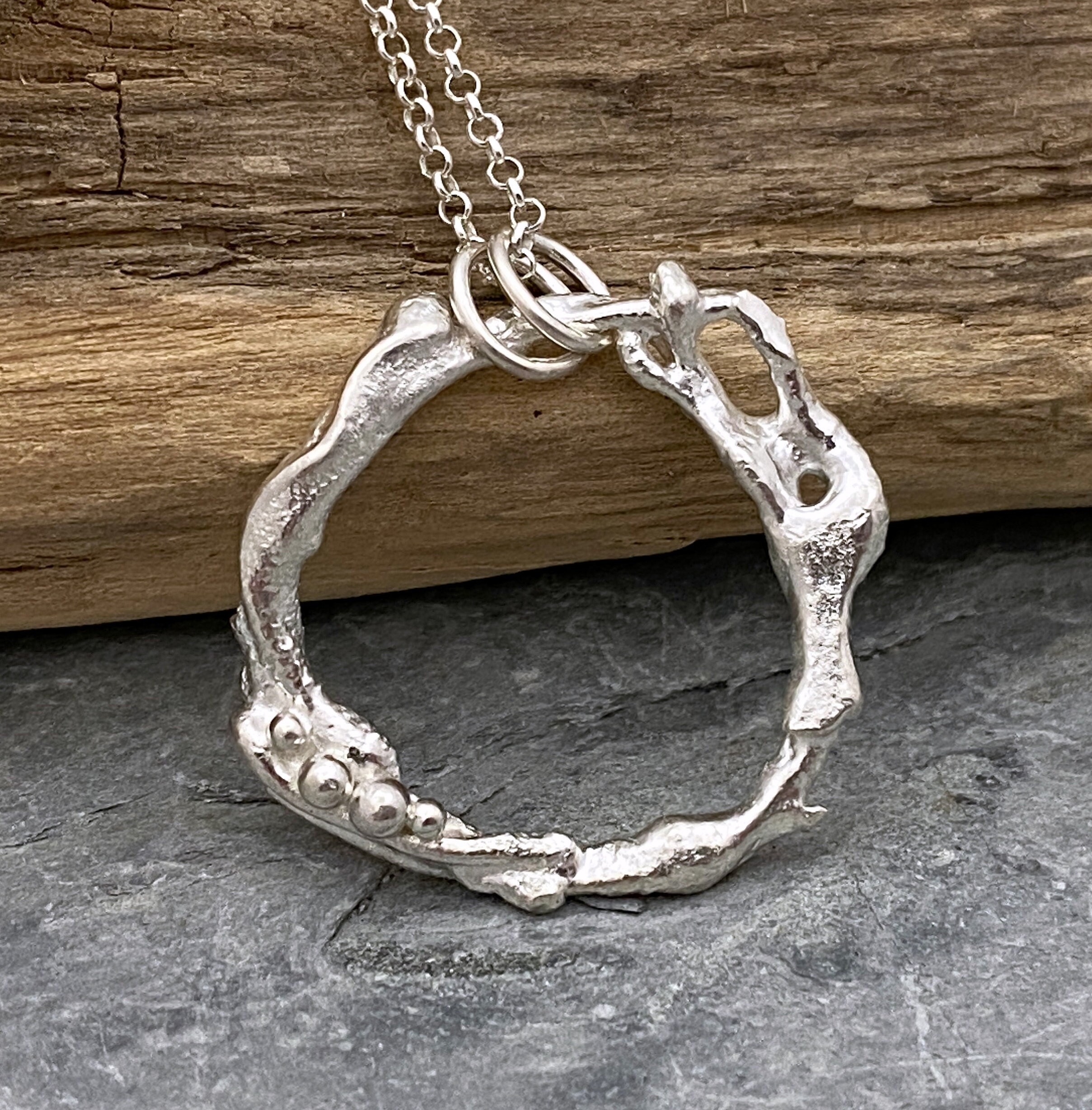 Organic Silver Circle Pendant Made From Molten Recycled