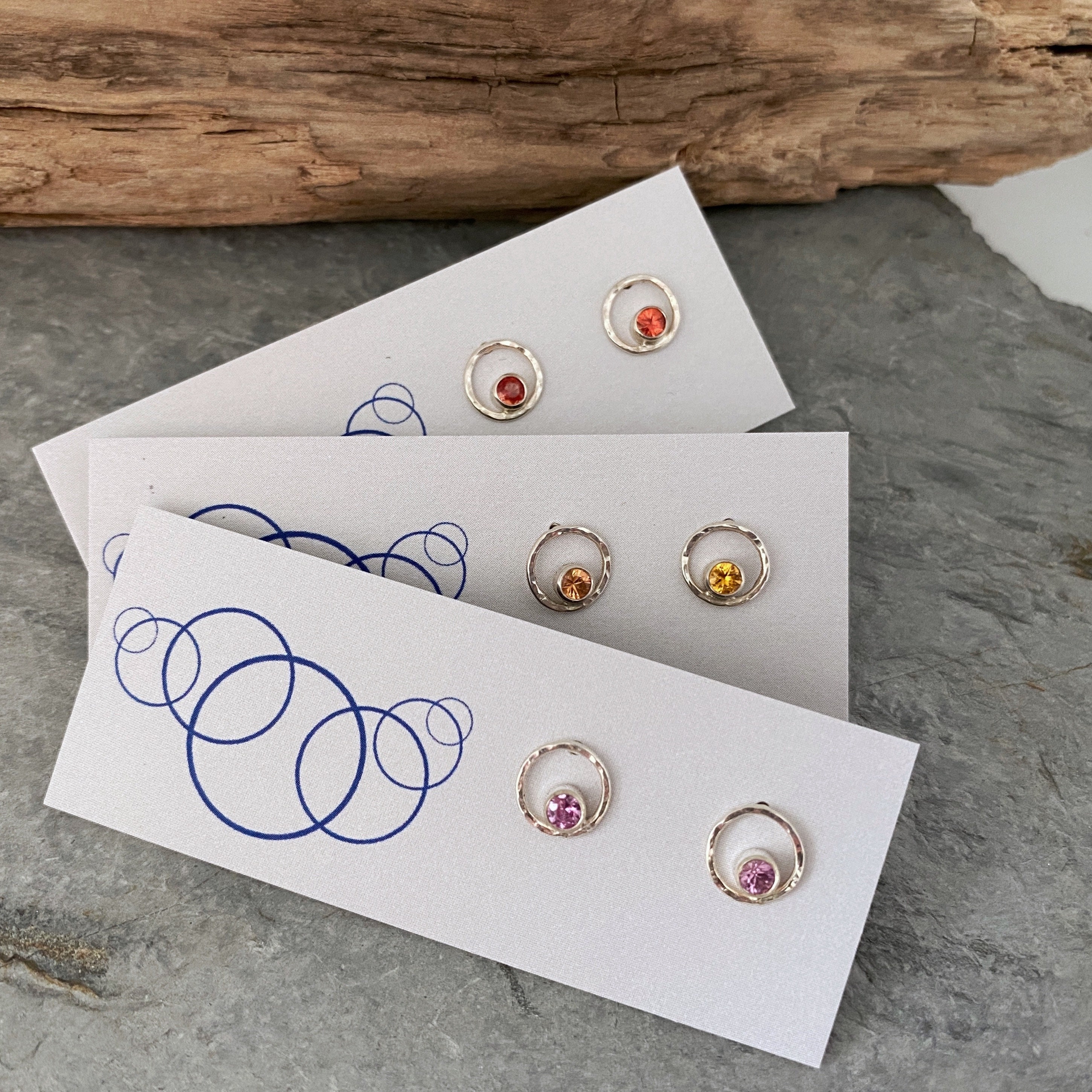 Small Round Hammered Silver Stud Earrings Set With Multi Coloured Sapphire Gemstones