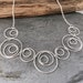 see more listings in the Silver hoops and circles section