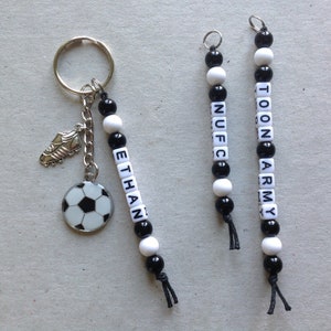 Personalised Any Name Football Keyring, Newcastle United Colours, NUFC, Toon Army, School Bag Charm. Birthday Gift, Football Fan, Gift Pouch