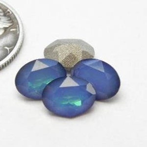 Wit opaal hemelsblauw F (8x6mm) Swarovski 4120 gefacetteerde ovale stenen