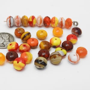 Cuentas de vidrio redondas abultadas facetadas Grand Canyon Sunset Blend (6 x 9 mm)