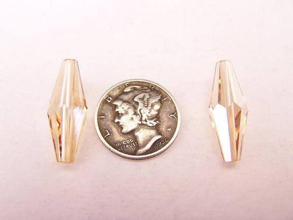 クリスタル ゴールデン シャドウ (20 x 8 mm) スワロフスキー アート