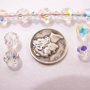 Cuentas espaciadoras redondas facetadas de cristal Swarovski 39 vintage de cristal AB (7 mm)