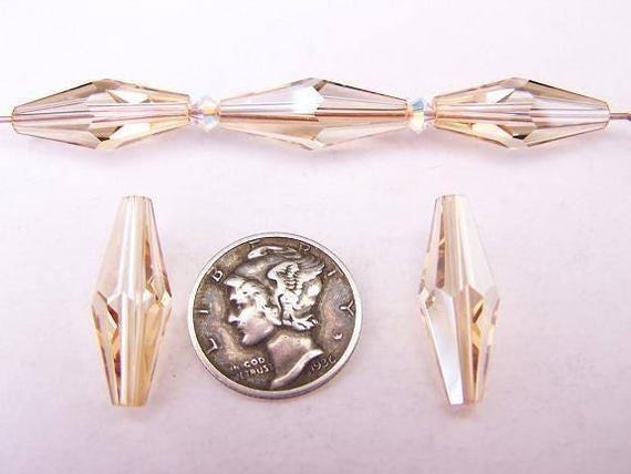 クリスタル ゴールデン シャドウ (20 x 8 mm) スワロフスキー アート