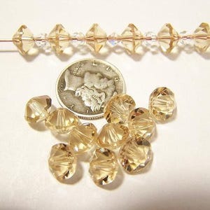 Ceylon Topaz (8mm) Vintage Swarovski 5307 Faceted Round Spacer Crystal Beads