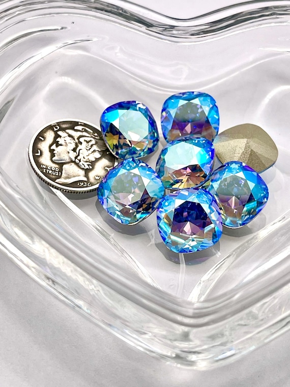 Light Sapphire Shimmer F (12mm) Swarovski 4470 Cushion Cut Light Sapphire Shimmer F (12mm) Swarovski 4470 Cushion Cut