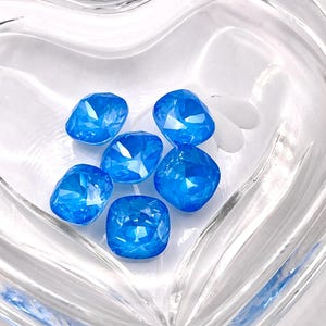 Electric Blue Ignite UNF (12mm) Swarovski 4470 Cushion Cut Stones
