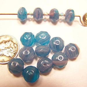 Cuentas de vidrio redondas abultadas facetadas de selva tropical (6 x 9 mm)