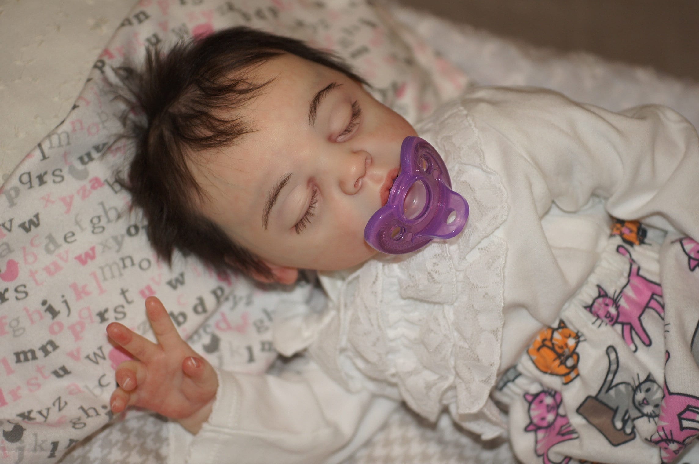 reborn dolls with their mouth open