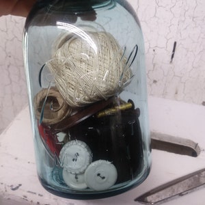 Vintage Blue Ball Jar with Sewing Notions: Buttons, Threads, Bobbins