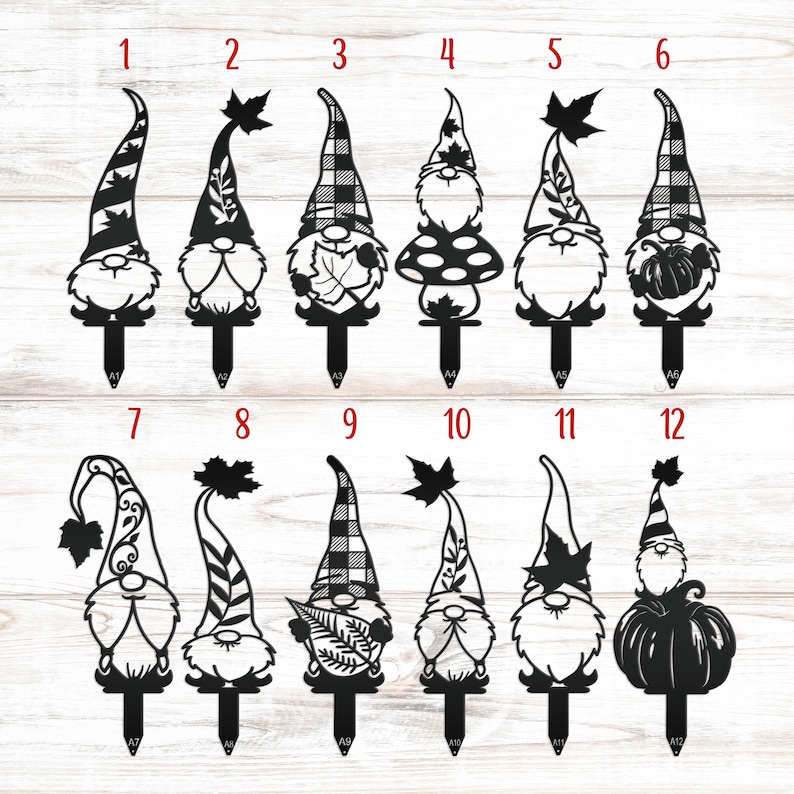 May include: A collection of twelve black metal garden gnomes with various hat designs, including plaid, leaf, and pumpkin motifs. Each gnome has a stake for easy placement in a garden or yard. The gnomes are numbered for selection.