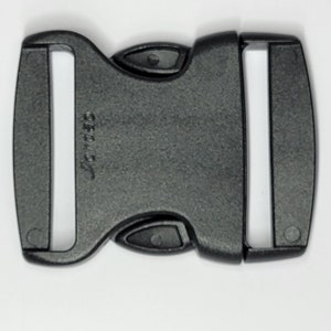 May include: Black plastic side release buckle with the word "Cordura" printed on the side.