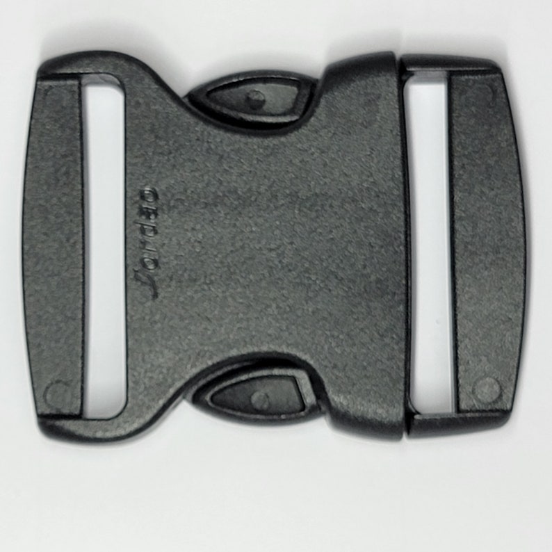May include: Black plastic side release buckle with the word "Cordura" printed on the side.