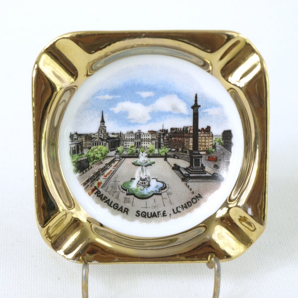 Cenicero vintage de recuerdo de viaje de Londres, cerámica con imagen de Trafalgar Square y borde pintado en oro - 3" x 3" - Muy buen estado