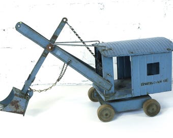 Vintage Original Structo Toys Construction Co Pressed Blue Steel Steam Shovel Excavator Moving Shovel with Wood Wheels circa 1930's