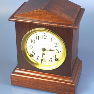Antieke Seth Thomas Adamantine palissander laminaat pendule circa eind 1800 Made in USA, getest en werkend - ontbrekende glazen wijzerplaat
