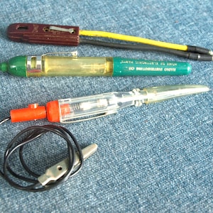 Vintage Oil Mate Pen by Radio Distributing Co and Eagle 90-600v A.C. - D.C & 6-12v Hong Kong Electric Volt Current Testers