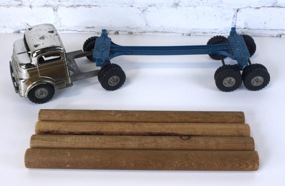 Vintage Structo Mfg Co. Pressed Steel Logging Truck Rig With