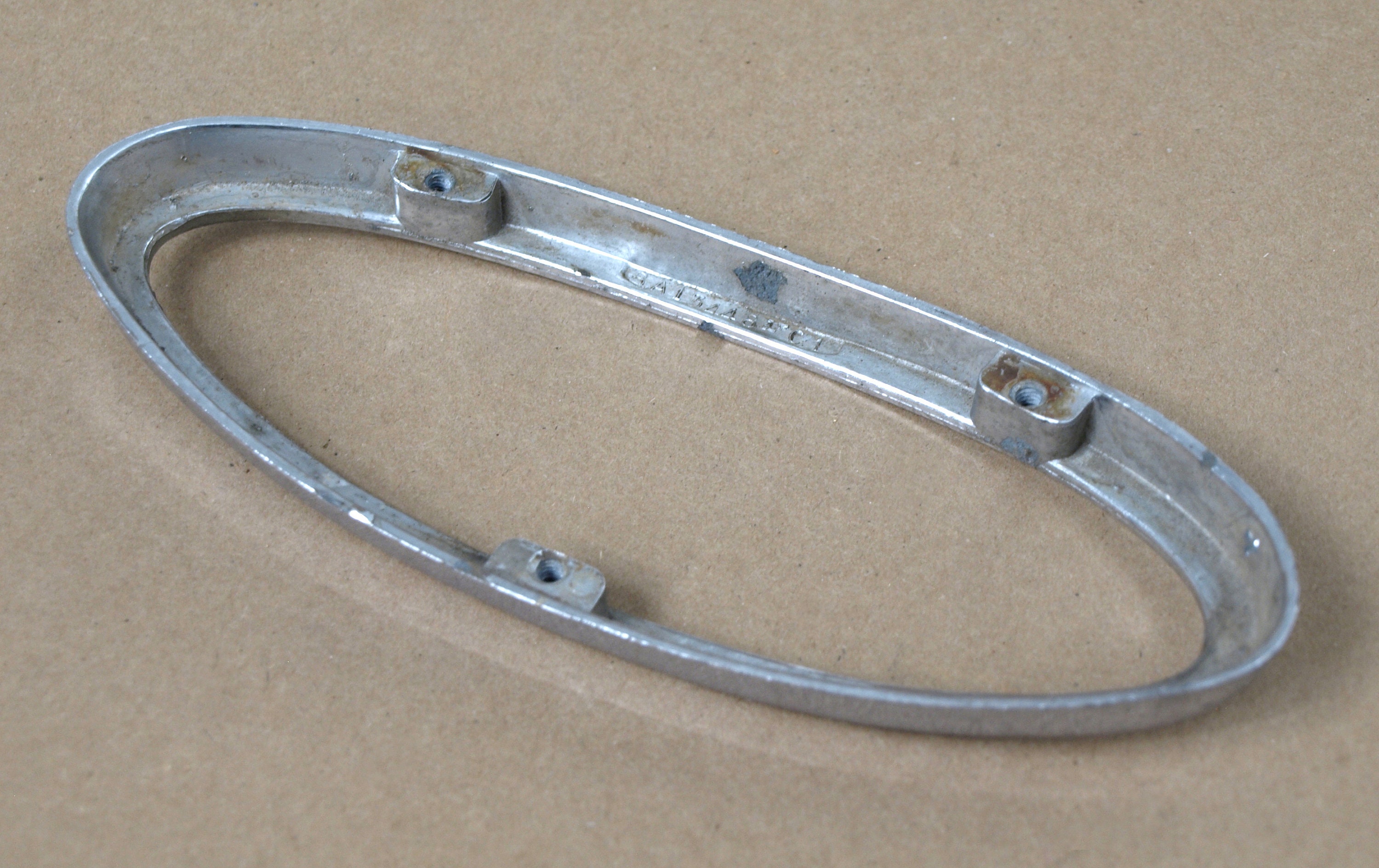 Chrome Tail Light Bezel for 1949-50 Ford Passenger Car Lower Rear 