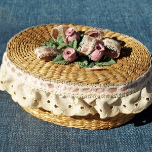 Small Woven Grass Lidded Oval Basket Keepsake Box with Hand Sewn Lace Edging and Floral Centerpiece Bow - Country Decor