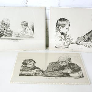 以下が含まれることがあります： 年配の方と子供のシーンを描いた、額装された3つの白黒イラスト。イラストは白い背景にあります。イラストは鉛筆またはインクの描画のようです。