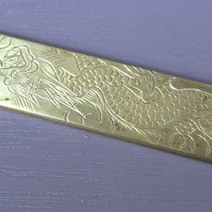 Antique Chinese Qing Dynasty Flat Brass Scroll Weight w/ Engraved Dragon Design - 68 grams - 6" long x 5/8" wide - Circa 1910's, VG