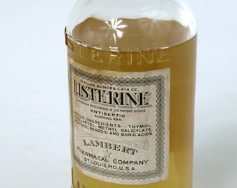 Listerine Lambert Pharmacal Co. Glass Bottle - 14 Fluid Ounces - Bakelite Cap - Complete Labels - St. Louis, Mo., USA - Mostly Full