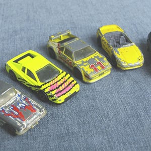 Vintage Matchbox Die Cast Car Lot of 4 - 1962 Corvette (84), BMW M.I. (81), Ferrari Testarossa (86), Mitsubishi 3000 GT Sypder (qty 2)