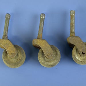 Antique Wooden Wheel Casters with Cast Iron Stems Lot of 3 circa 1800&#39;s Furniture Restoration Parts in Good Aged Condition