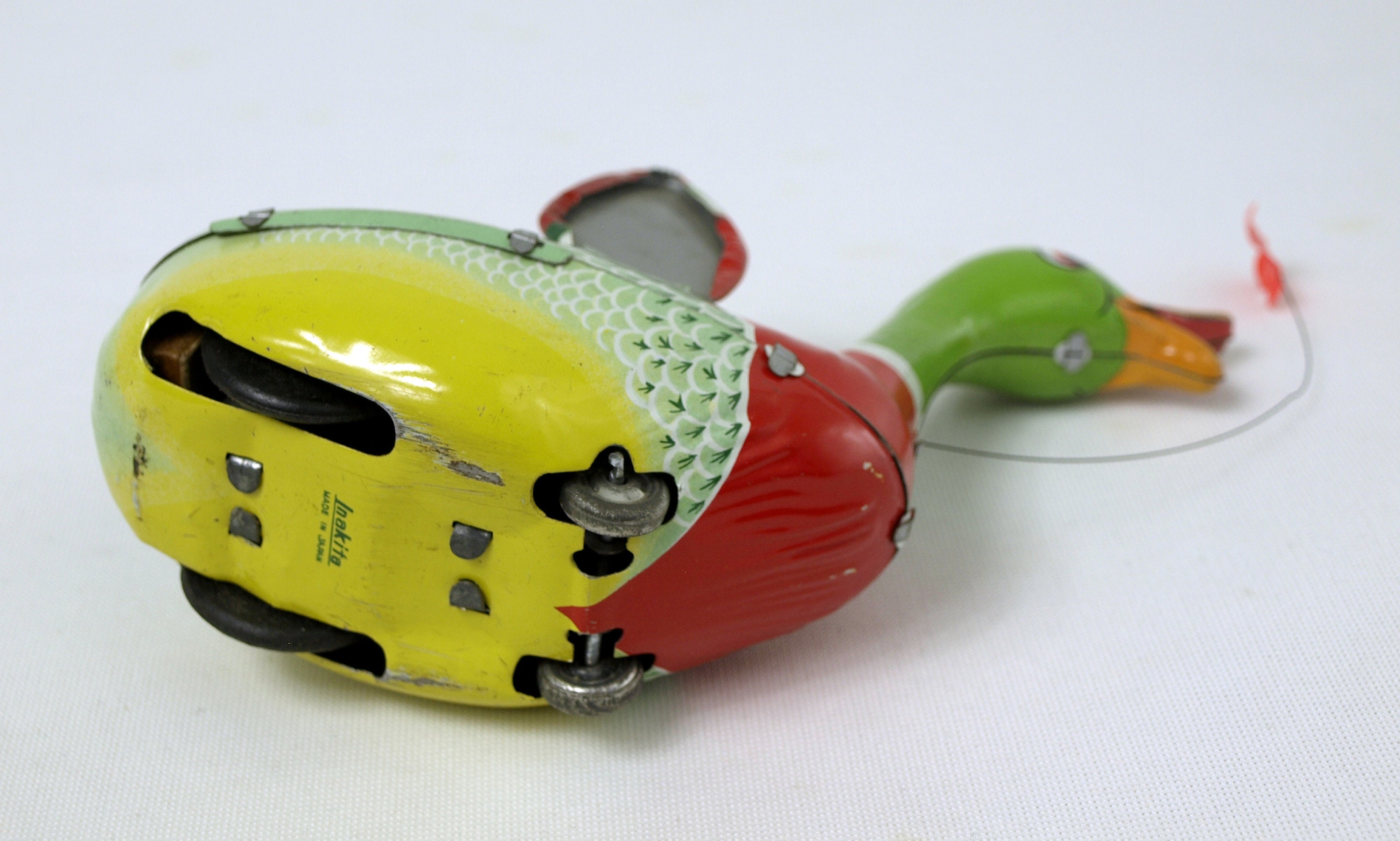 Vintage Inakita Tin Litho Running Duck Friction Toy From