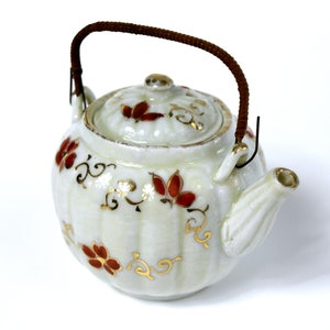 Vintage Asian Porcelain Miniature Teapot with Handpainted flowers, Gilt Detail and Natural Fiber Wound Handle - 2.5&quot; Tall - Good+ Condition