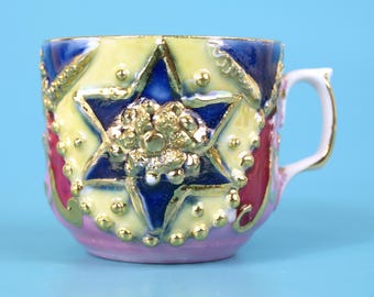 Antique Early 1900s German Pink Lusterware Demitasse Cup with Ornate Molded Star of David and Raised Gold Gilt Relief