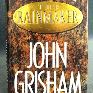 THE RAINMAKER by John Grisham, 1995 - First Edition, Published by Doubleday - Hard Cover with Dust Jacket - Very Good