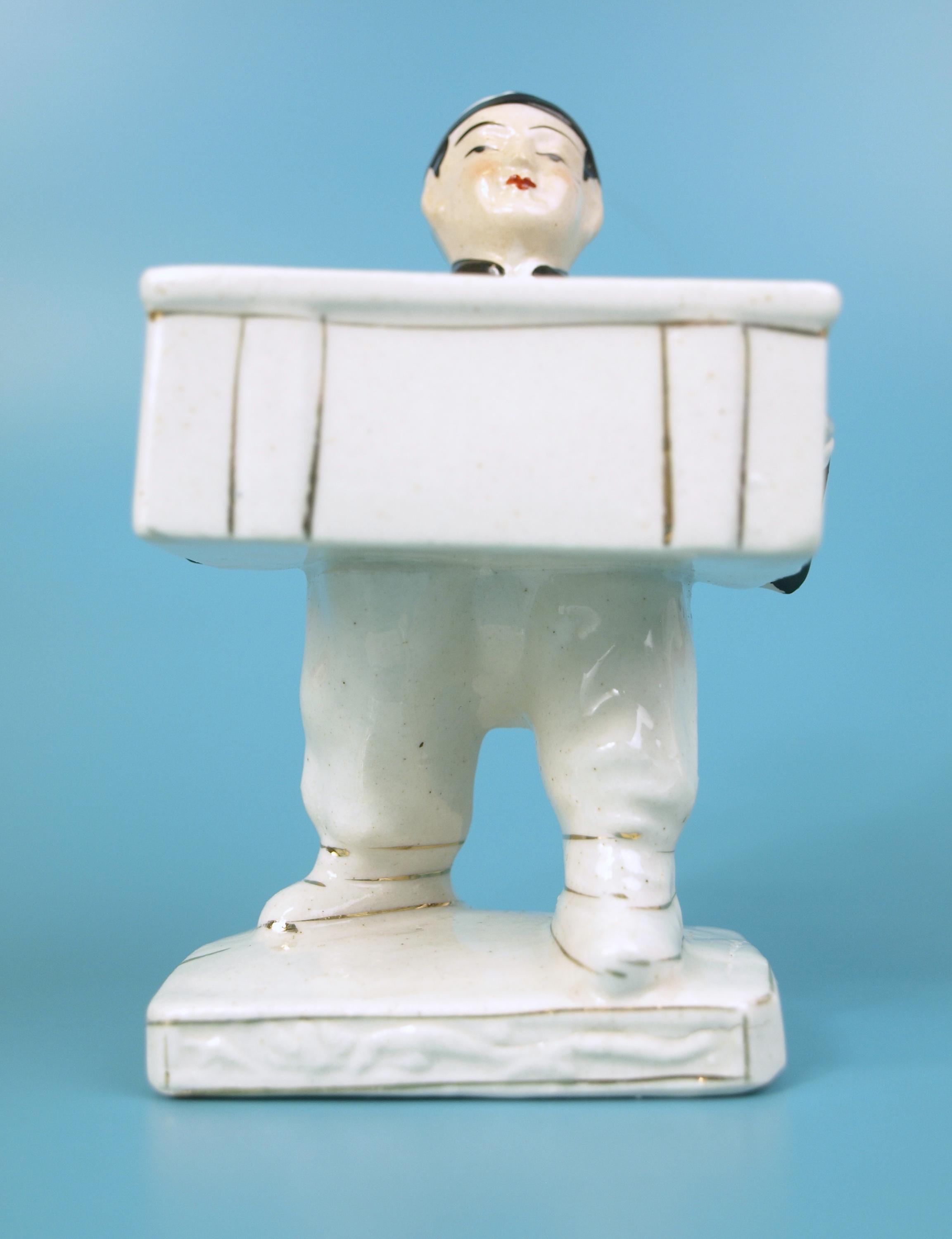 Vintage Porcelain Figure of Asian Man Holding a Travel Trunk (no