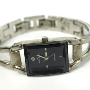 Vintage ANNE KLEIN Silvertone and Black Ladies Quartz Wrist Watch - Rectangular Case w/ Black Dial & Silvertone Band - In Working Condition