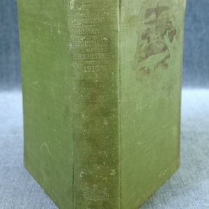 May include: A green book with the title "Pennsylvania Report of the Department of Agriculture 1913" on the spine.