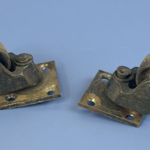 Antique Cast Iron Swivel Caster Wheels, Set of 2 with 1.25&quot; Diameter Wheels and 2&quot; x 2&quot; attachment plate in Good Aged condition