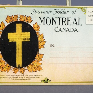 May include: A souvenir folder from Montreal, Canada, featuring a picture of a glowing cross on Mount Royal. The folder has a place for a stamp and a space for a message. "The Cross Shines Forth in Mystic Glow - The beacon placed on the top of Mount Royal, Montreal, by the St. Jean Baptiste Society. It is illuminated every night."