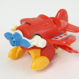 Vintage Pilot Smurf Wind-up Airplane, made by PAYO - Circa 1982 - Key Included, Missing the Smurf - Toy in Very Good Working Condition