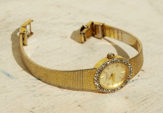 caravelle watch vintage gold