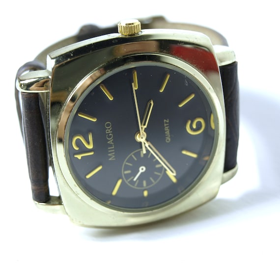 Reloj de pulsera de cuarzo MILAGRO vintage para hombre muy buen estado de funcionamiento con correa de piel sintetica marron Etsy Mexico