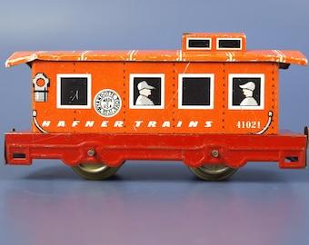 Vintage Hafner-Züge Overland Flyer Nr. 41021 Orange Weißblech Caboose mit roter Basis Zinn Litho Spielzeug