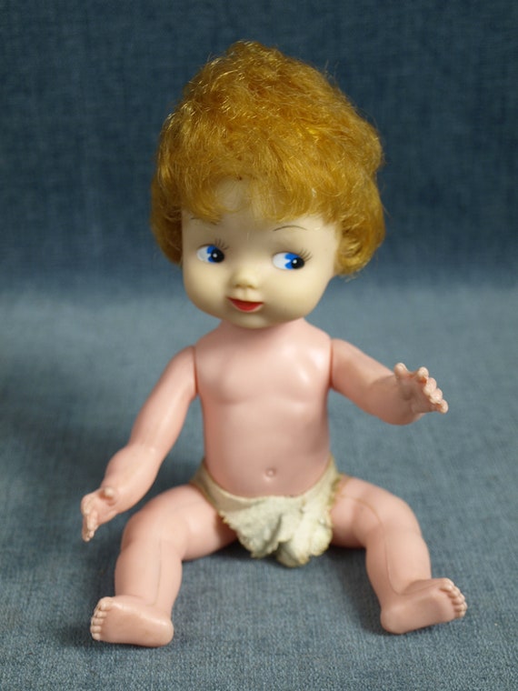 Baby doll with red hair and blue eyes sale