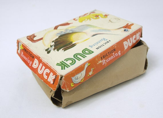 Vintage Inakita Tin Litho Running Duck Friction Toy From